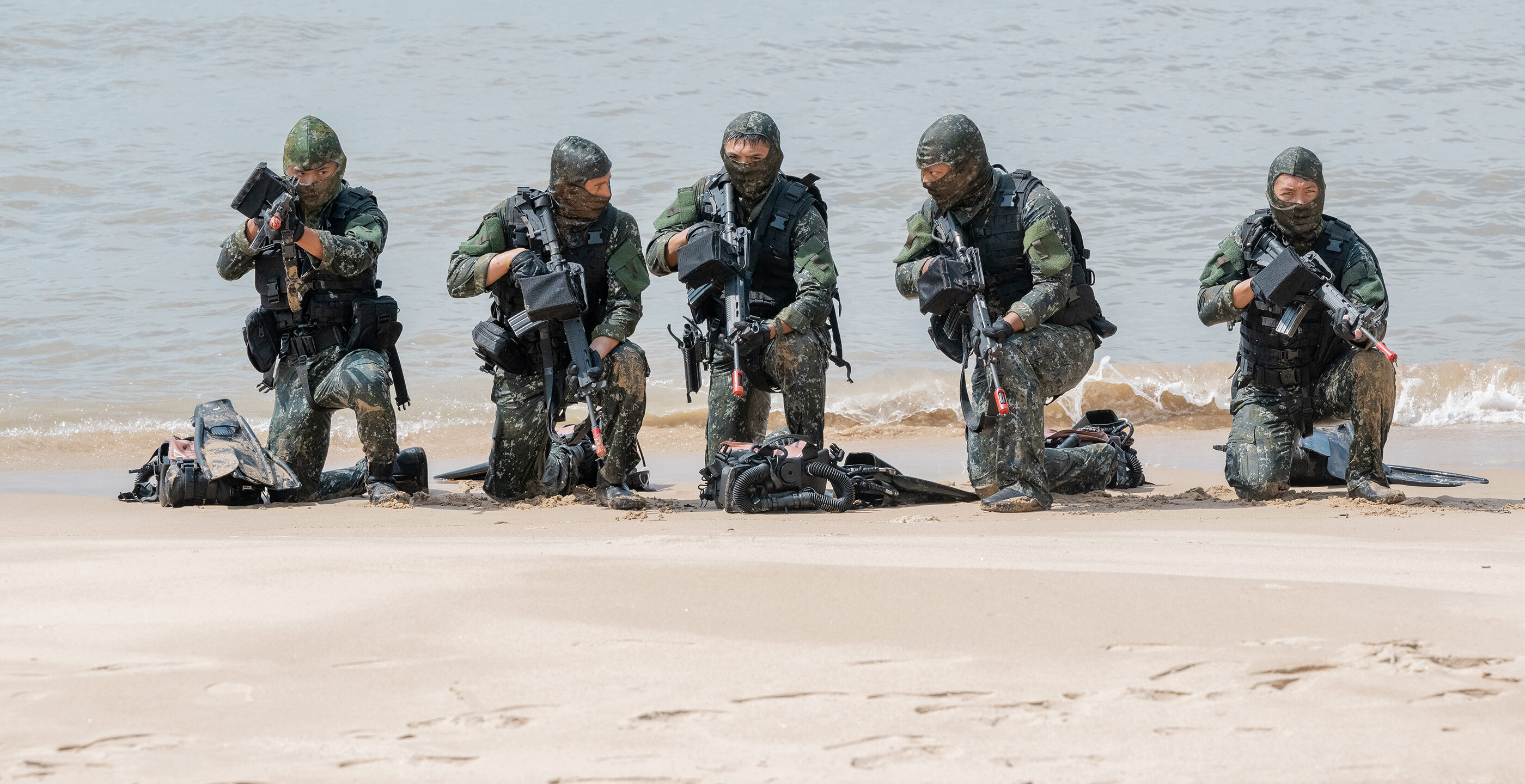 Taiwan soldiers engage in a drill to defend the island's beaches.