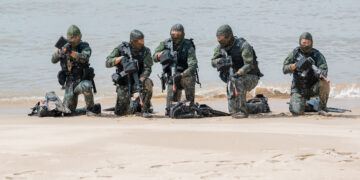 Taiwan soldiers engage in a drill to defend the island's beaches.